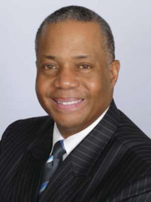 Professional Head Shot of a Middle Aged African American Male in a Suit and Tie